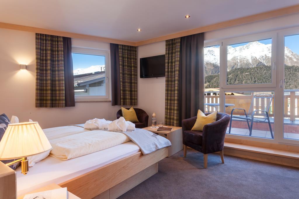 Hotel Hochland Nauders Pokoj fotografie